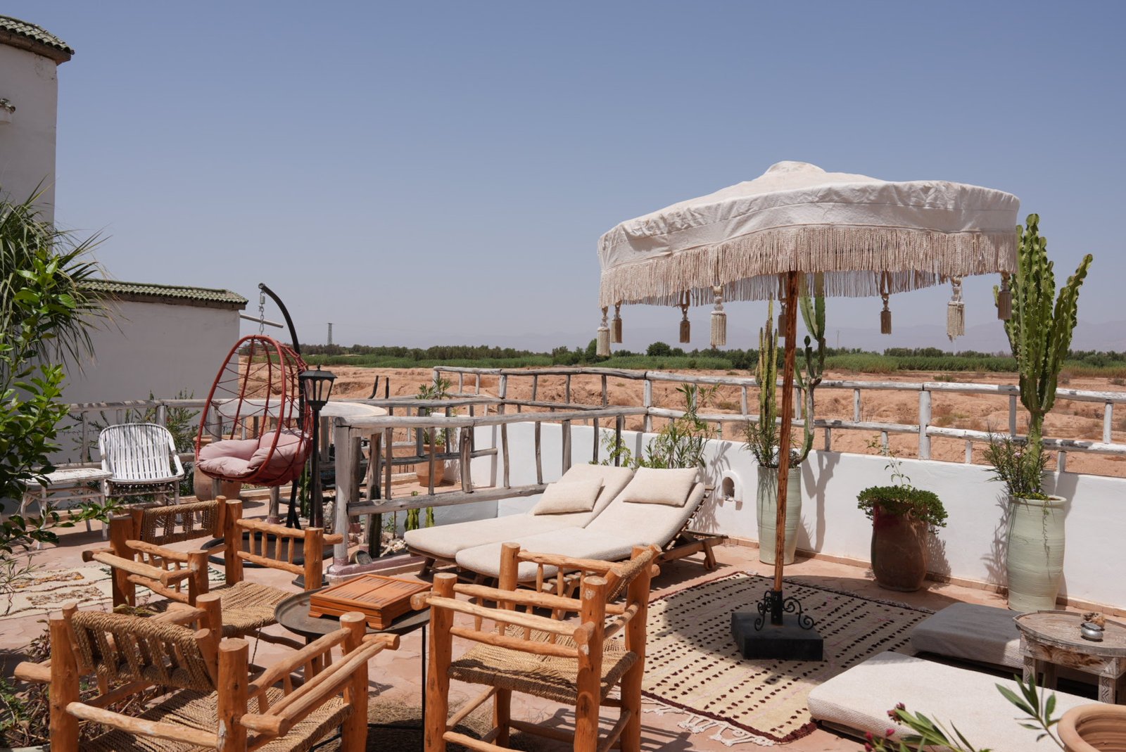 Rooftop lounge with the Atlas Mountains in the distance